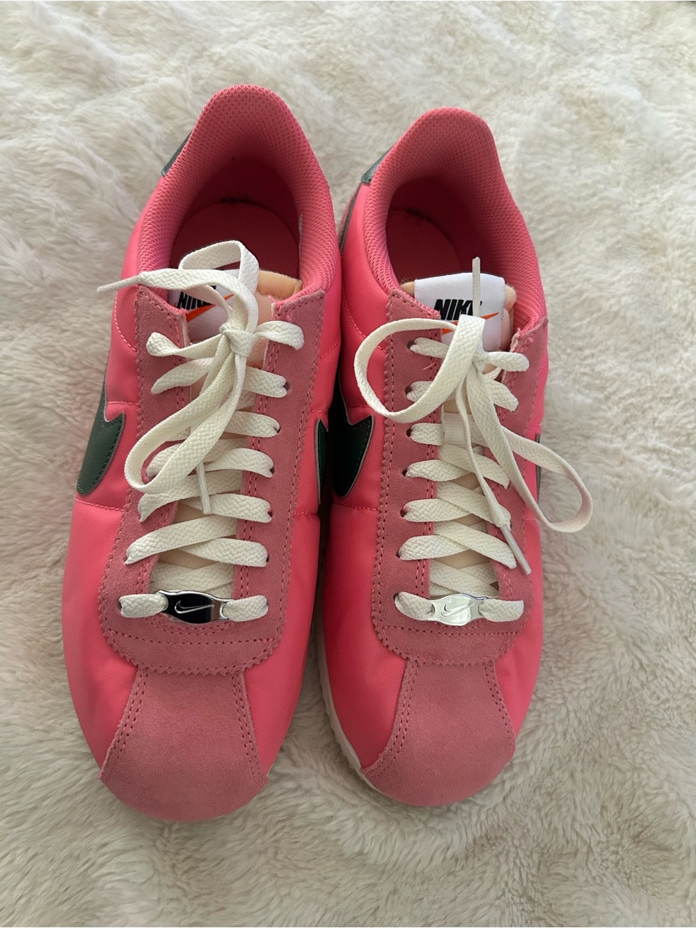 Nike Women’s Pink Sneakers with Green Swoosh
